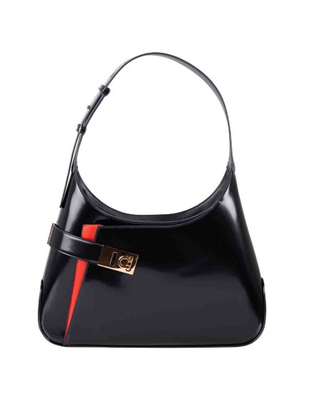 Shop SALVATORE FERRAGAMO  Bag: Salvatore Ferragamo hobo shoulder bag.
Contrasting details.
It has a rounded line at the bottom and an asymmetrical pocket on the front, secured by a gold-finish Gancini buckle and emphasized by the flame red bellows.
Internally lined, it is completed with a zip pocket and double leather slot. It closes with a bridge and magnet and is worn on the shoulder thanks to the wide adjustable shoulder strap.
Dimensions: height 23.0 CM length 35.0 CM depth 6.0 CM.
Composition: 100% calf leather.
Made in Italy.. 215492 766663-005